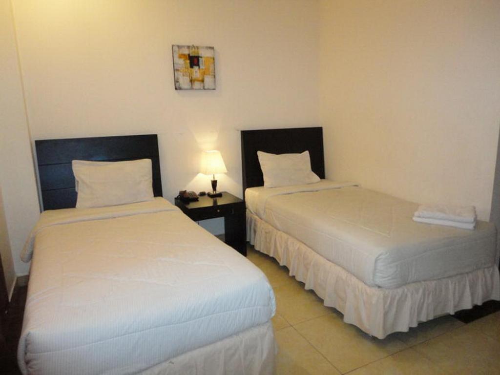 Grand Duta Hotel Palu Pokoj fotografie