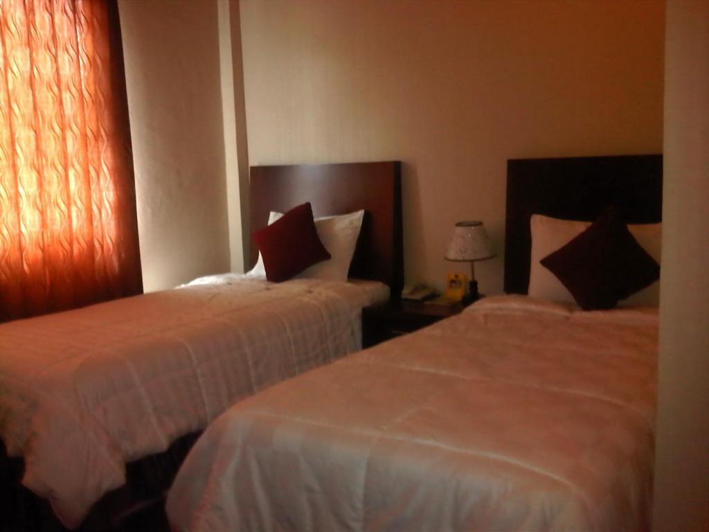 Grand Duta Hotel Palu Pokoj fotografie