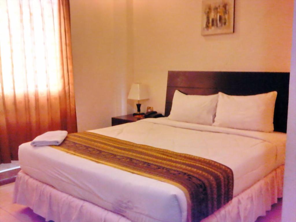 Grand Duta Hotel Palu Pokoj fotografie